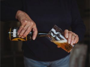 Tudor Brewery Sugarloaf Real Ale Pouring In A Glass